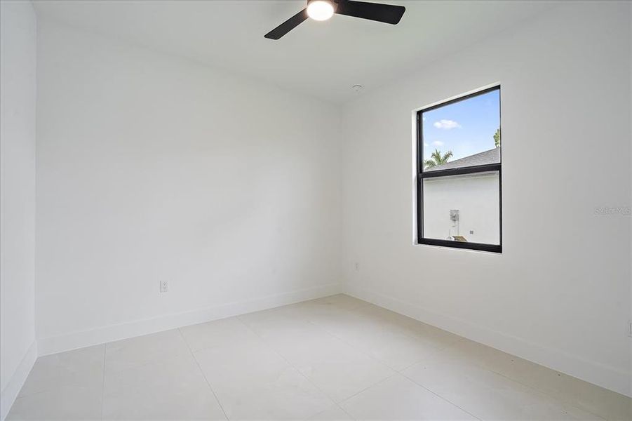 Spacious, unfurnished interior of a new home in , Port Charlotte (Image 23).