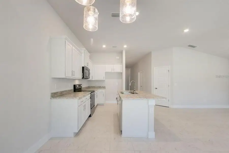 Furnished interior view inside a new home in Ocala Crossings South, Ocala (Image 4).