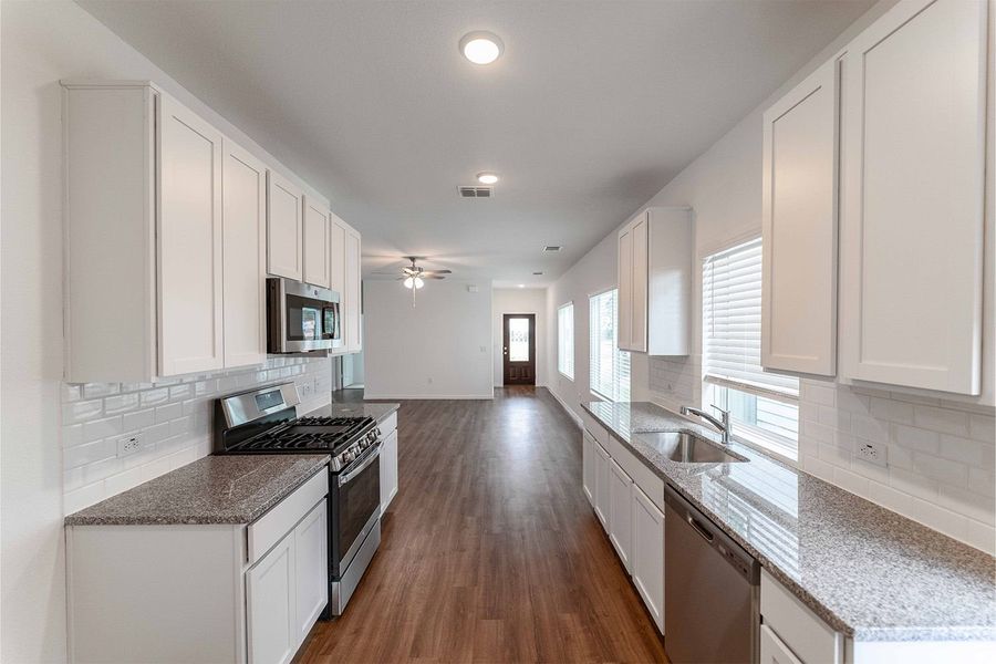 Furnished interior view inside a new home in Paramount, Kyle (Image 4).