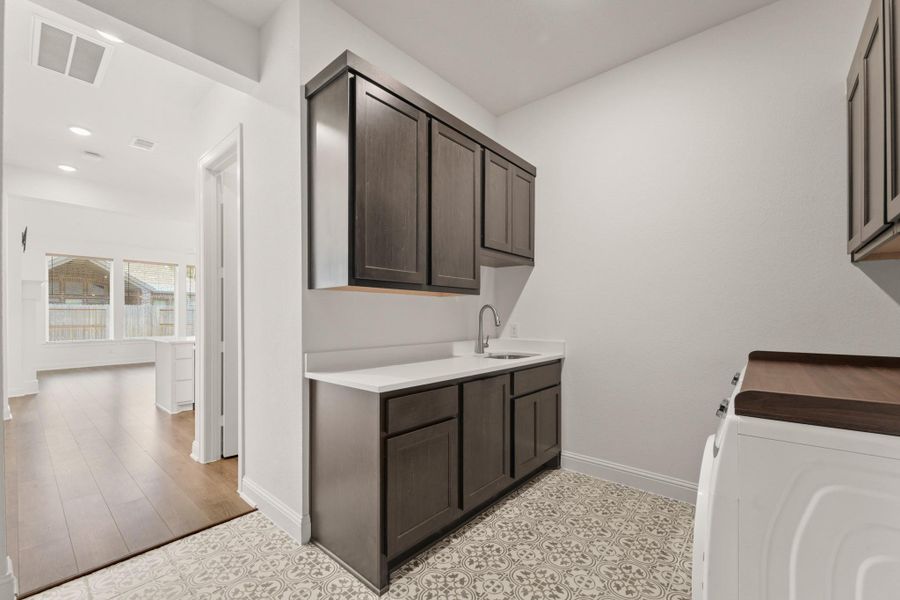 Furnished interior view inside a new home in The Highlands - 65', Porter (Image 7).