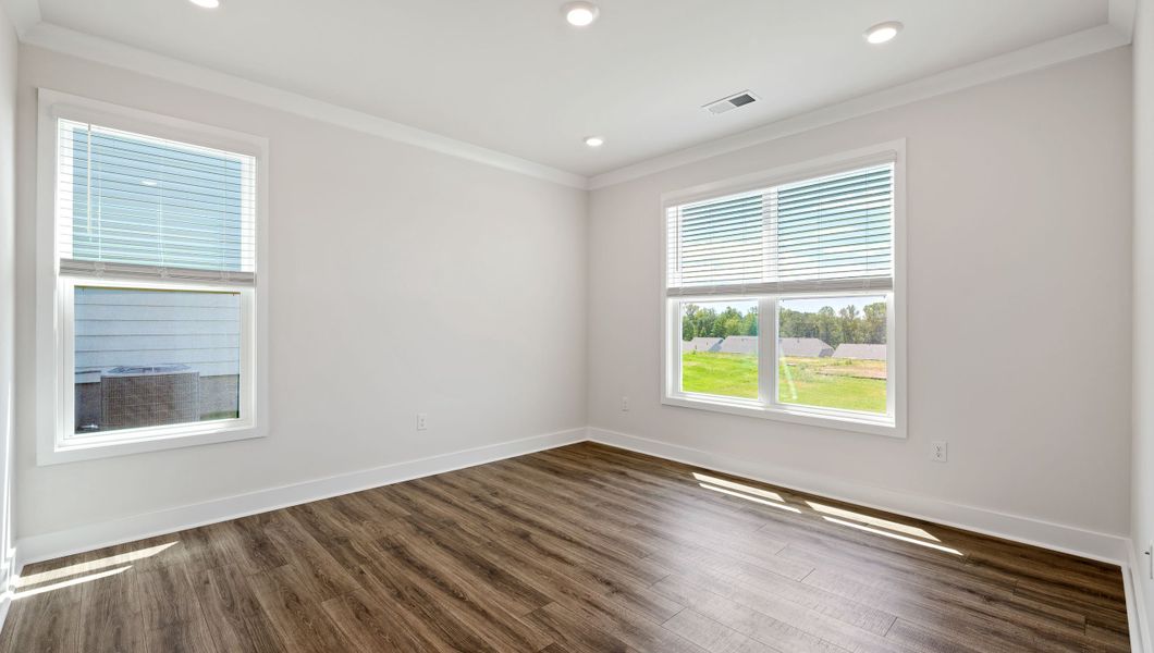 Spacious, unfurnished interior of a new home in Adams Glen, Greenville (Image 21).