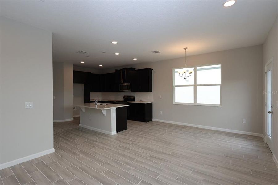 Spacious, unfurnished interior of a new home in Tribute at Ovation, Winter Garden (Image 35).