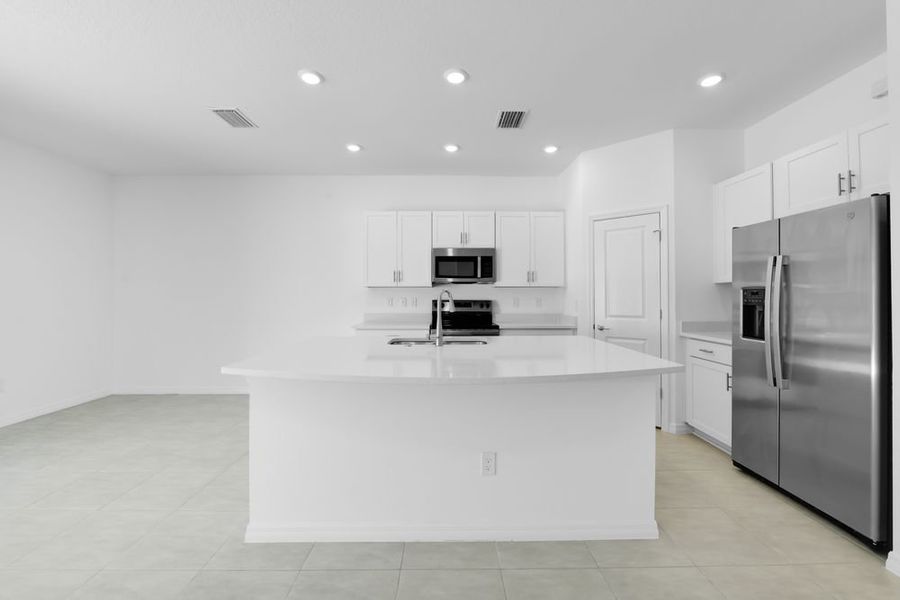 Furnished interior view inside a new home in Vinterra Townhomes, Nokomis (Image 5).