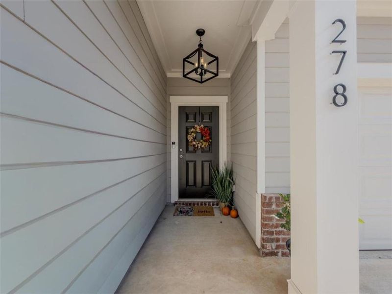 Exterior details and patio area of a home in Bentwater, Hoschton (Image 28). Exterior details and patio area of a home in Bentwater, Hoschton (Image 28).
