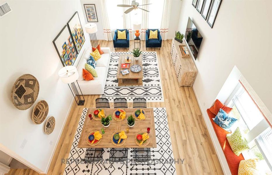 Living area with wood finished floors and baseboards