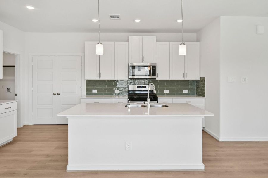 Photo is not of the actual home, but is an inspirational photo of builder’s model home and may depict options, furnishings, and/or decorator features that are not included