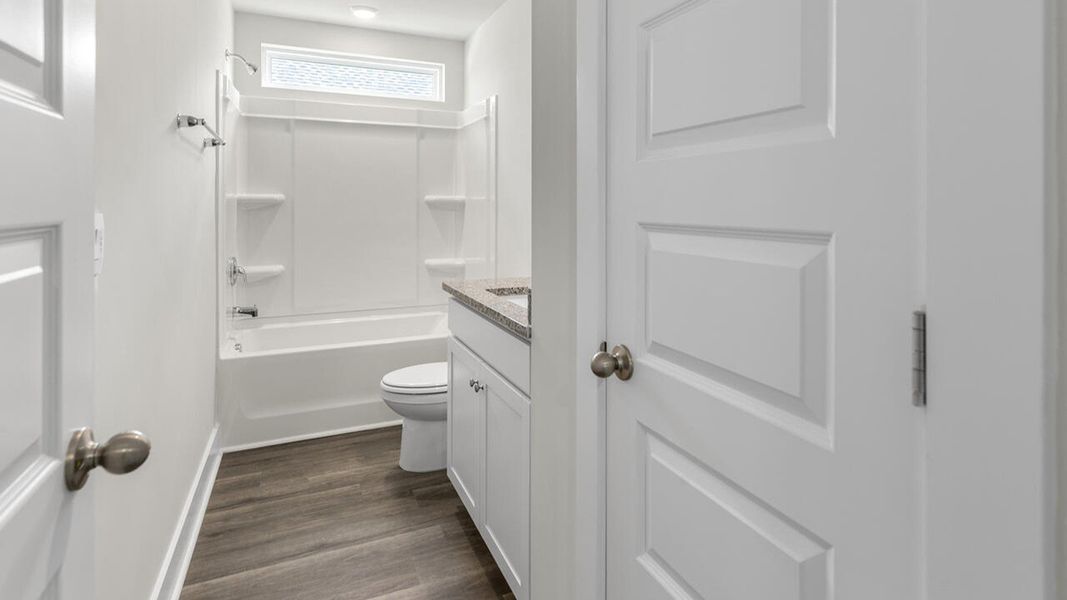 Furnished interior view inside a new home in Surfside Landing, Hubert (Image 16).
