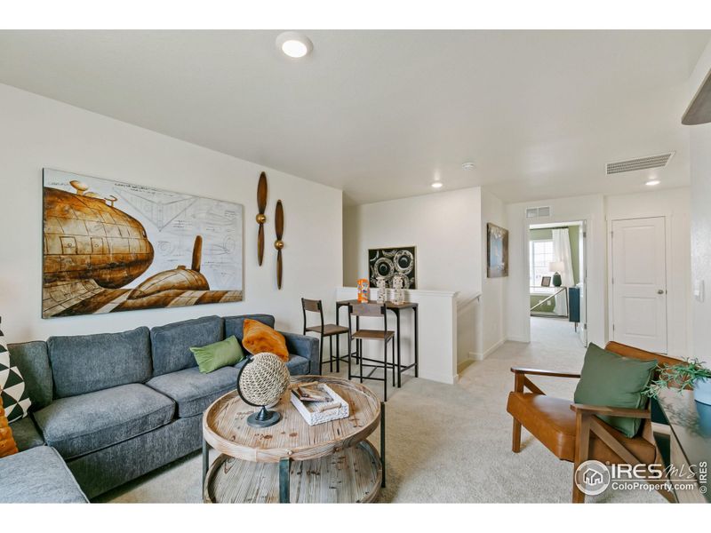 Furnished interior view inside a new home in Settlers Crossing, Commerce City (Image 9).
