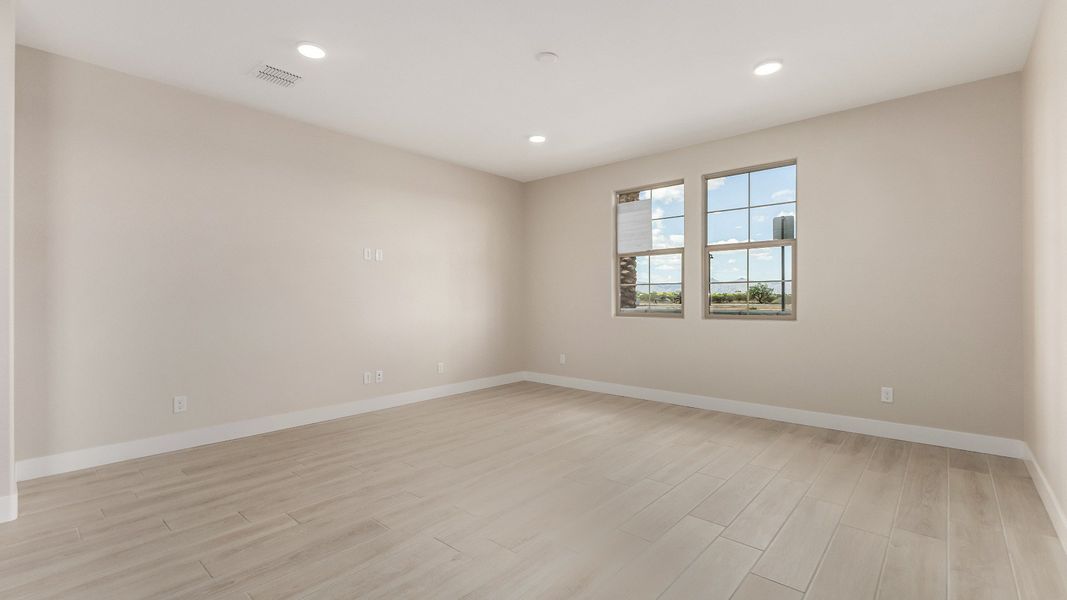 Representative furnished interior of a home built from the The Delaney by DRB Homes in Surprise City Center, Surprise (Image 5).