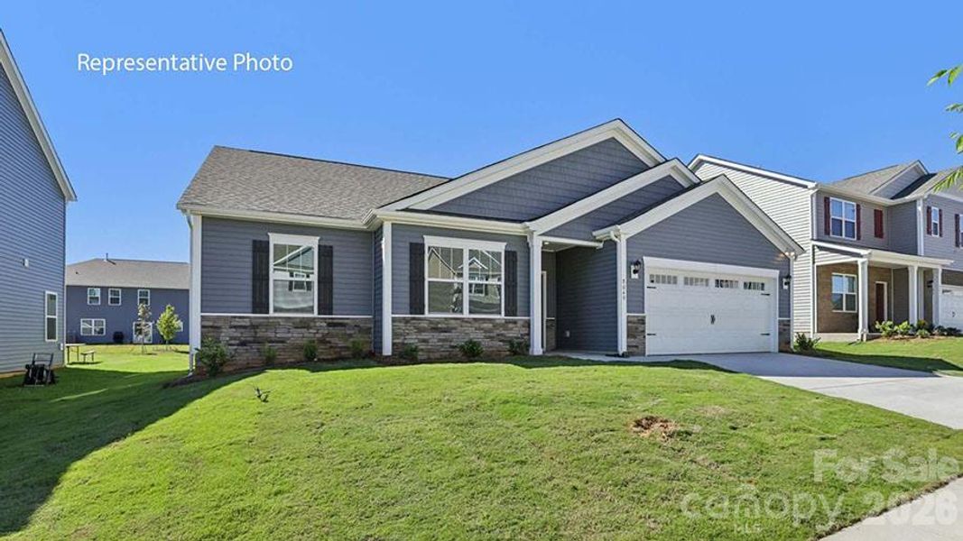 Front exterior of a new home in Wallace Springs, Statesville, NC, highlighting curb appeal (Image 1). Front exterior of a new home in Wallace Springs, Statesville, NC, highlighting curb appeal (Image 1).