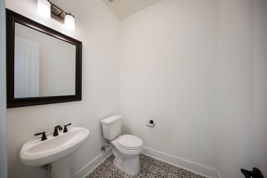 Representative furnished interior of a home built from the The Travis by Whitestone Custom Homes in Johnson Ranch, Bulverde (Image 18).