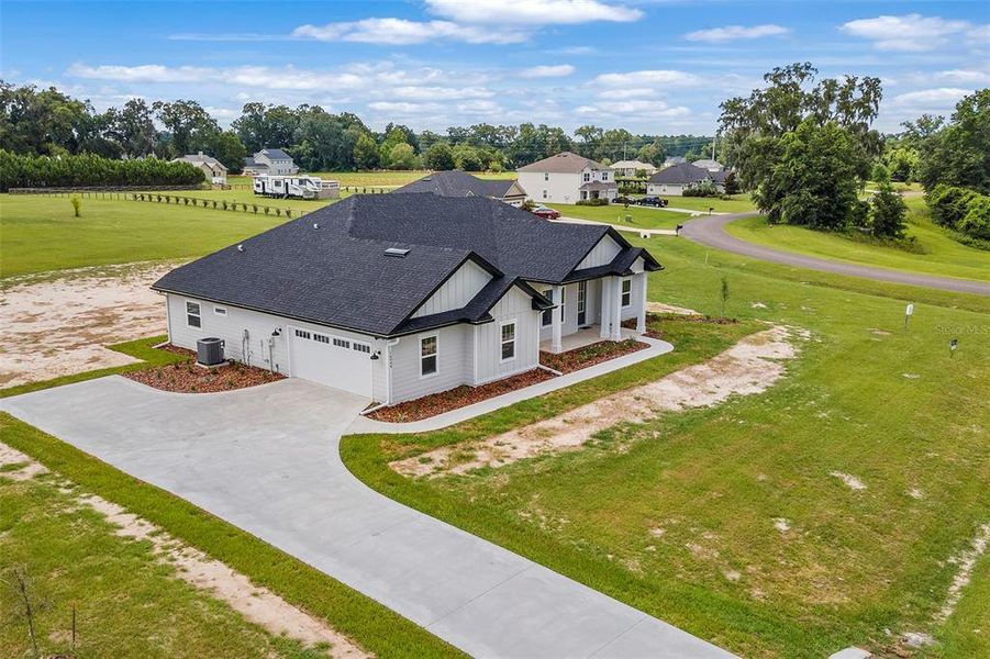 Front exterior of a new home in , Lake City, FL, highlighting curb appeal (Image 18). Front exterior of a new home in , Lake City, FL, highlighting curb appeal (Image 18).
