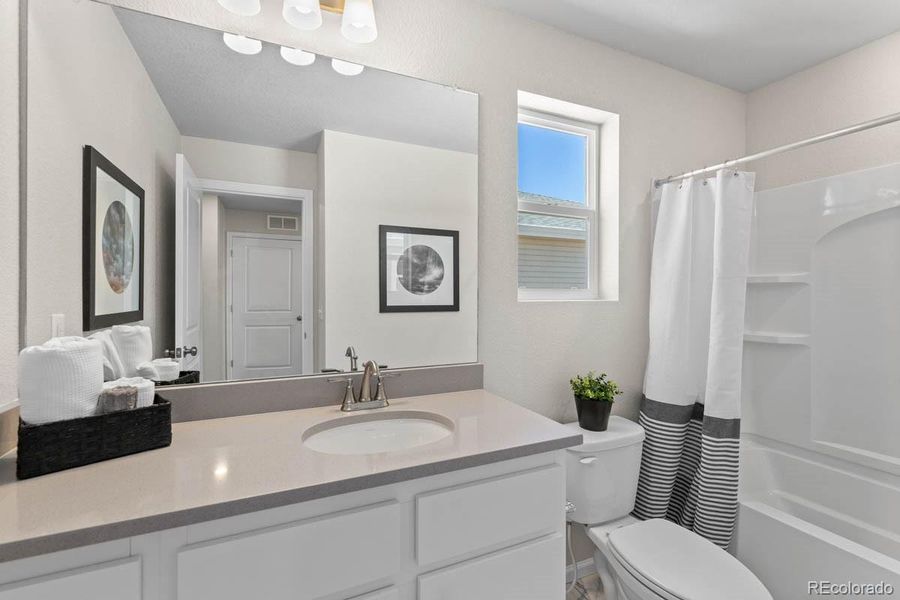 Furnished interior view inside a new home in Green Valley Ranch, Aurora (Image 19).