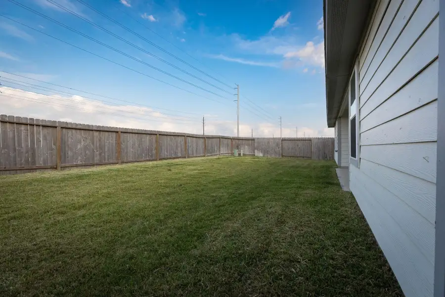 Exterior details and patio area of a home in , Fulshear (Image 26).
