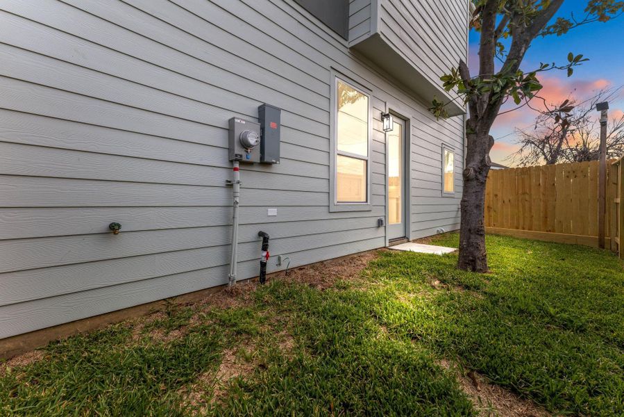 Take advantage of the added bonus of a rare side yard, offering endless possibilities to transform it into your own serene outdoor oasis. Whether it's a cozy retreat for relaxation or an inviting space for entertaining, this tranquil area provides the perfect backdrop for creating your ideal outdoor sanctuary. Take advantage of the added bonus of a rare side yard, offering endless possibilities to transform it into your own serene outdoor oasis. Whether it's a cozy retreat for relaxation or an inviting space for entertaining, this tranquil area provides the perfect backdrop for creating your ideal outdoor sanctuary.