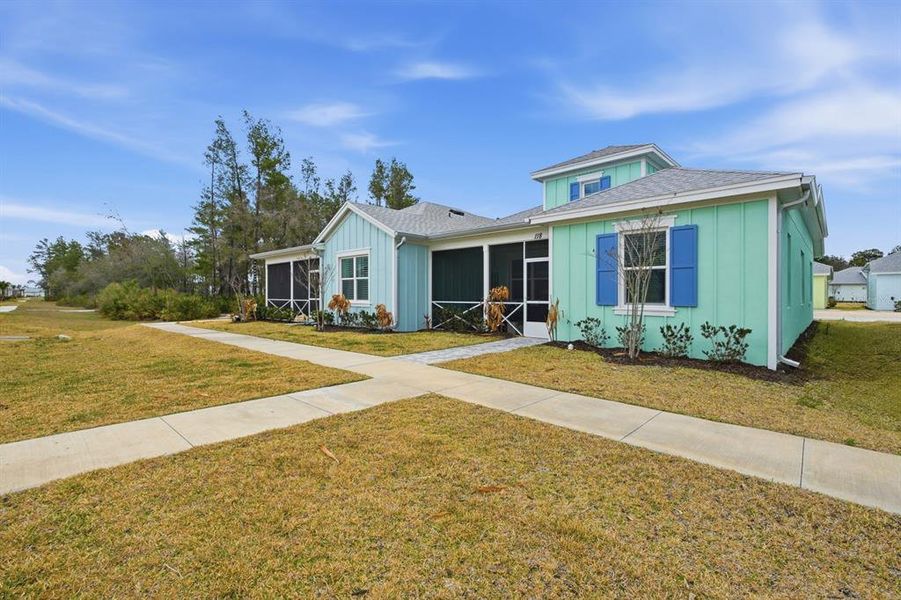 Front exterior of a new home in , Daytona Beach, FL, highlighting curb appeal (Image 1). Front exterior of a new home in , Daytona Beach, FL, highlighting curb appeal (Image 1).