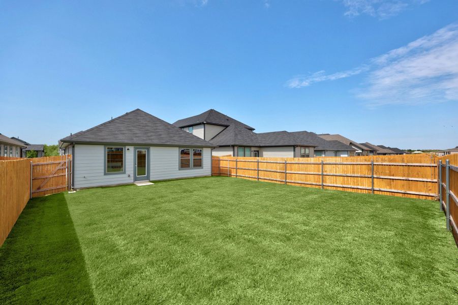 Exterior details and patio area of a home in Trinity Ranch, Elgin (Image 20).