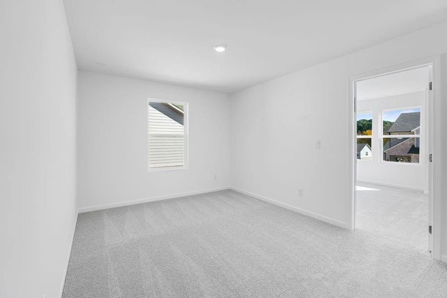 Spacious, unfurnished interior of a new home in Windance Lake, Loganville (Image 39).
