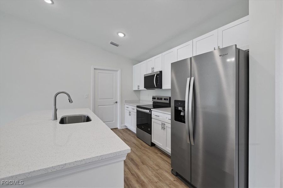 Furnished interior view inside a new home in Cape Coral, Cape Coral (Image 12).