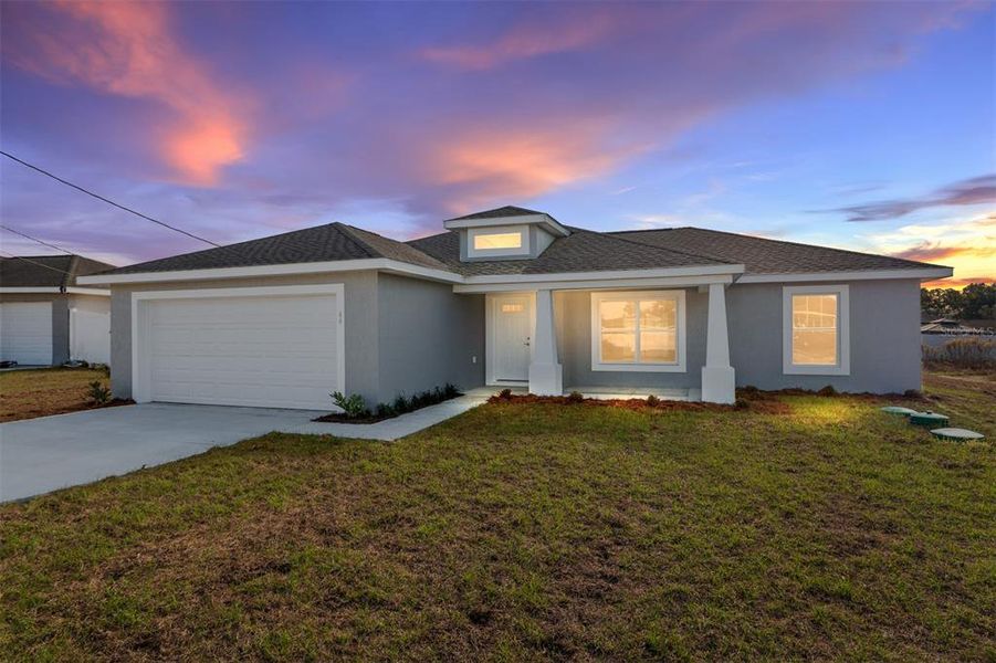 Front exterior of a new home in , Ocala, FL, highlighting curb appeal (Image 1). Front exterior of a new home in , Ocala, FL, highlighting curb appeal (Image 1).