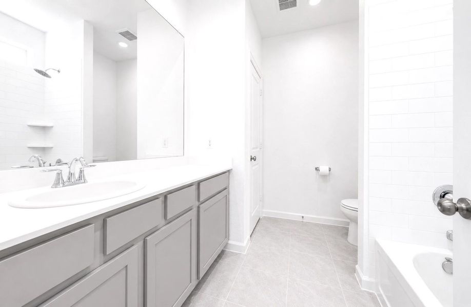 Furnished interior view inside a new home in The Trails, New Caney (Image 7).