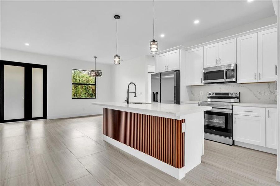 Furnished interior view inside a new home in , Port Charlotte (Image 12).
