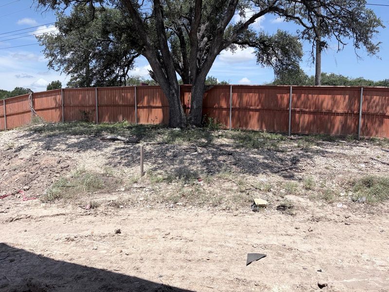 Mature trees line the property, providing natural shade and privacy. Mature trees line the property, providing natural shade and privacy.