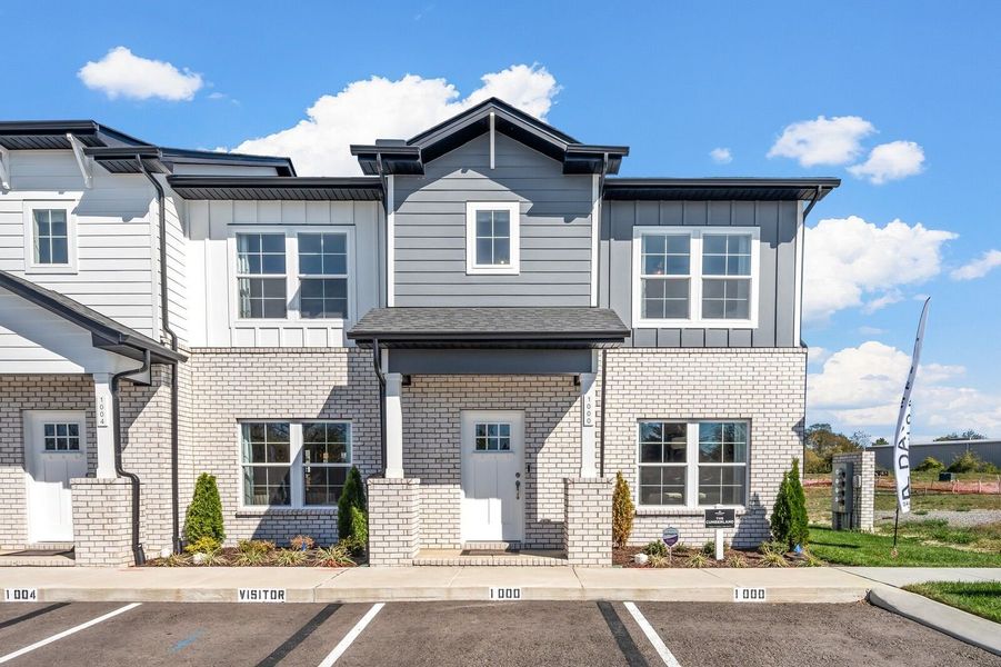 Front exterior of a new home in The Towns at Red River, Gallatin, TN, highlighting curb appeal (Image 2).