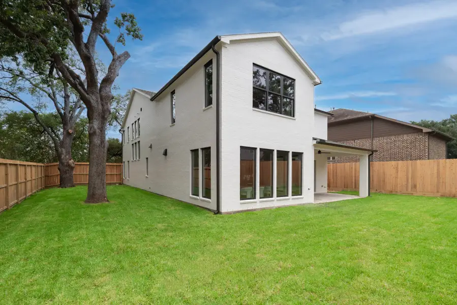 Exterior details and patio area of a home in , Houston (Image 14). Exterior details and patio area of a home in , Houston (Image 14).