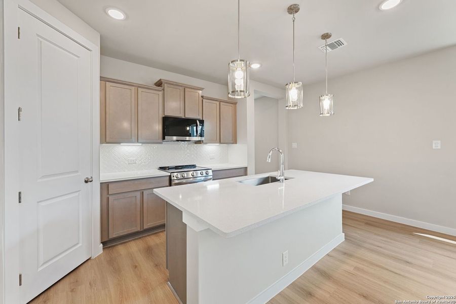 Furnished interior view inside a new home in Highland Ridge, New Braunfels (Image 10).