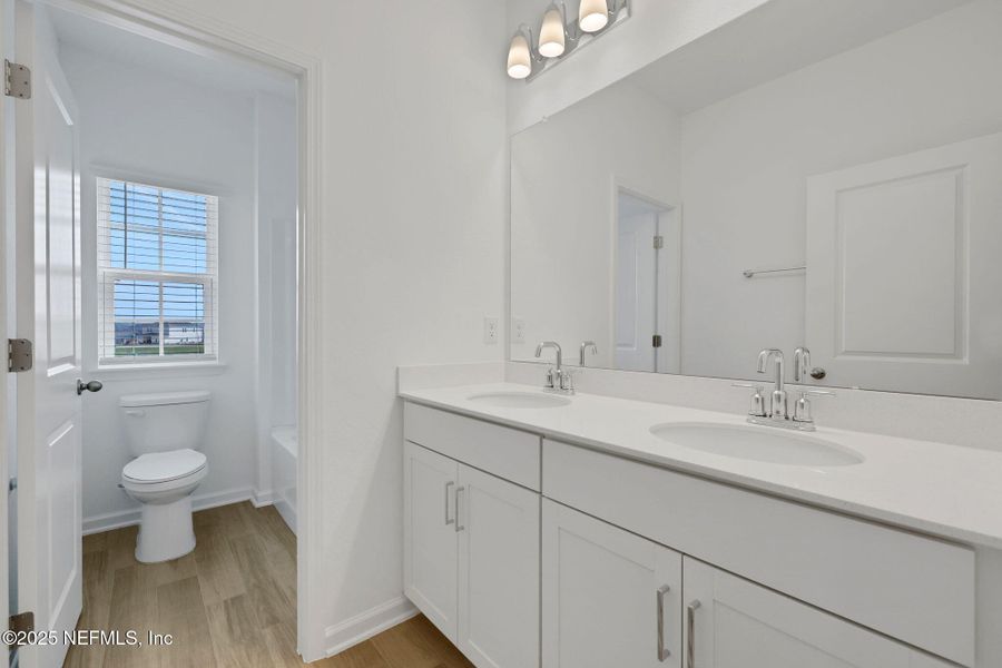 Furnished interior view inside a new home in TrailMark, St. Augustine (Image 8).