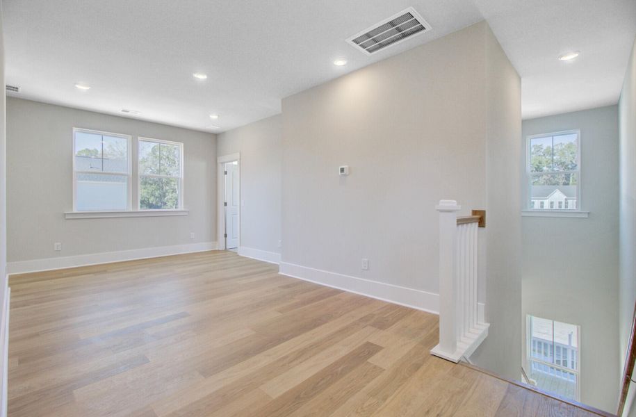 Spacious, unfurnished interior of a new home in Indigo Grove Single Family Homes, Johns Island (Image 19).