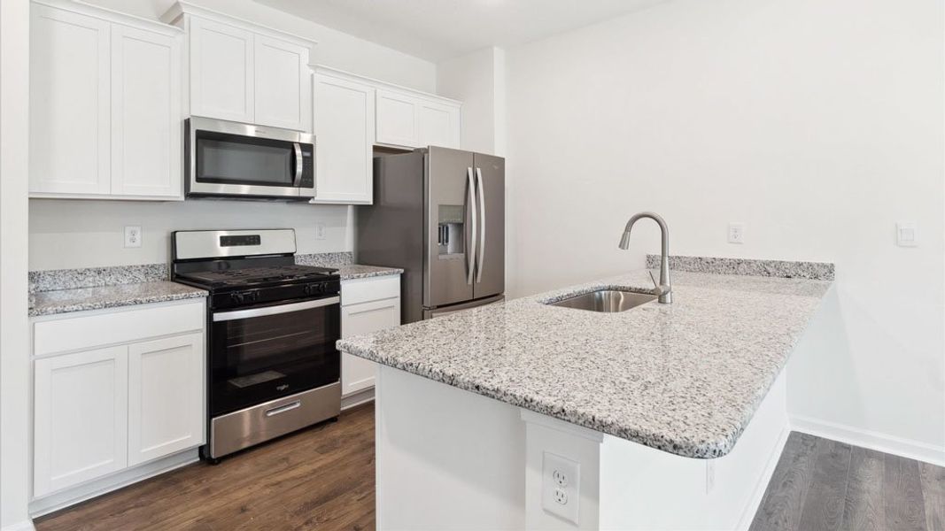 Representative furnished interior of a home built from the Freeport by D.R. Horton in The Hideaway at Fox Meadows, Bluff City (Image 4).