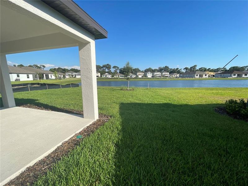 Exterior details and patio area of a home in Isles at BayView, Parrish (Image 15).
