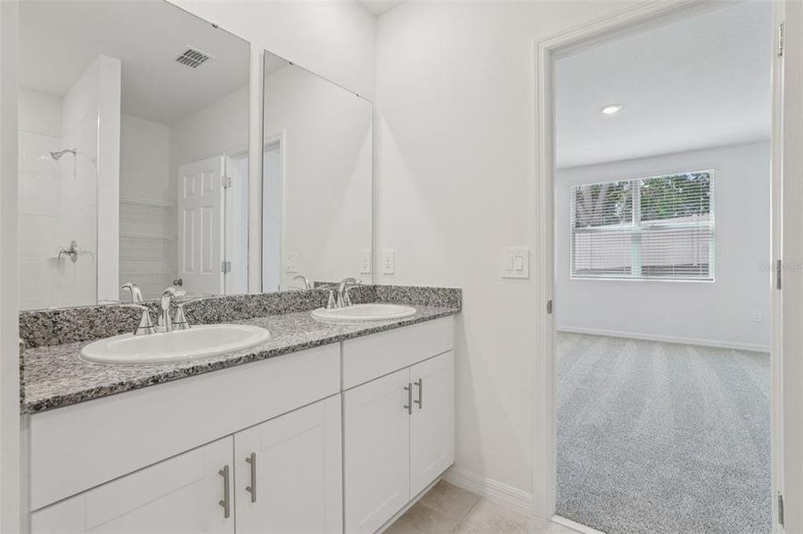 Furnished interior view inside a new home in Deer Run at Crosswinds, Davenport (Image 8).
