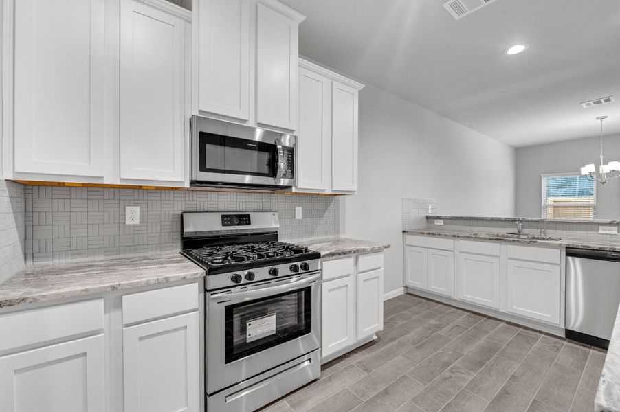 Representative furnished interior of a home built from the Floor Plan 1774 by Colina Homes in Rollingbrook Estates, Baytown (Image 15).