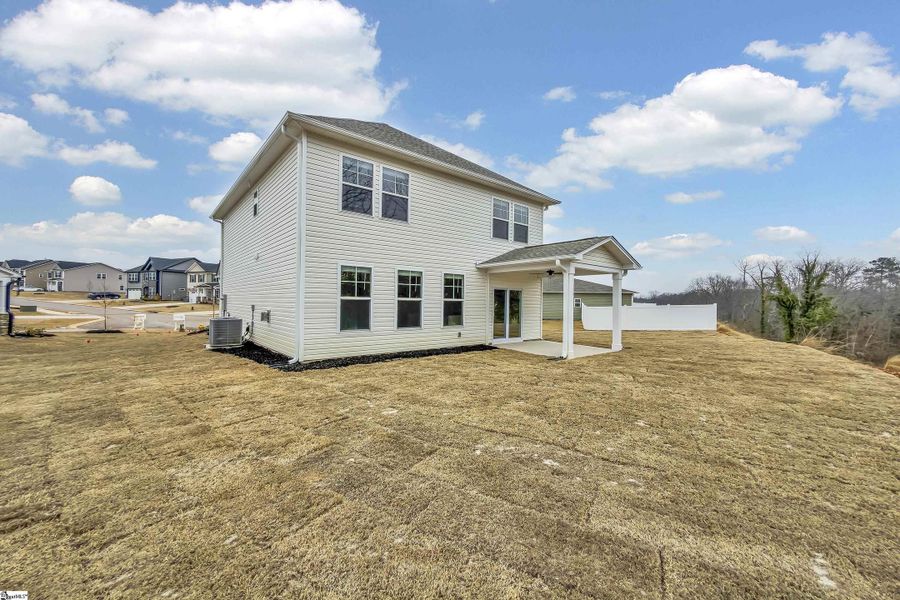 Exterior details and patio area of a home in Sedona, Greenville (Image 17).