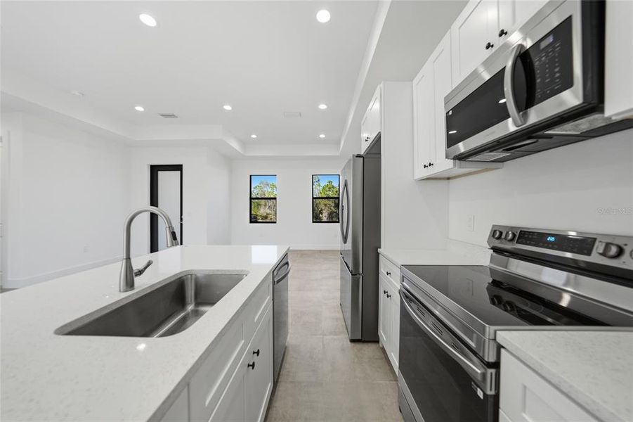 Furnished interior view inside a new home in , Punta Gorda (Image 11).