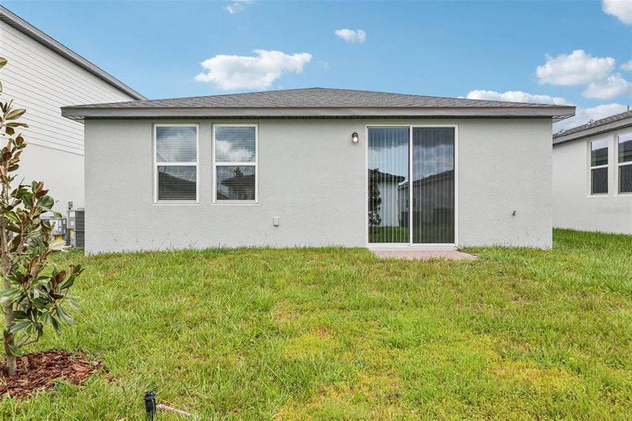 Exterior details and patio area of a home in Hamilton Bluff - Classic Series, Lake Hamilton (Image 28).