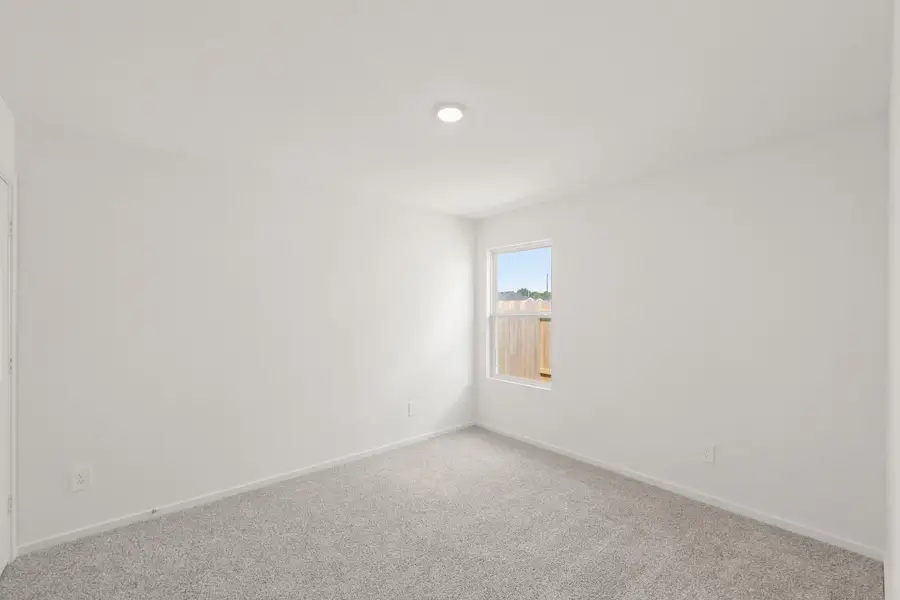 Spacious, unfurnished interior of a new home in Harrington Trails at The Canopies, Splendora (Image 9). Spacious, unfurnished interior of a new home in Harrington Trails at The Canopies, Splendora (Image 9).