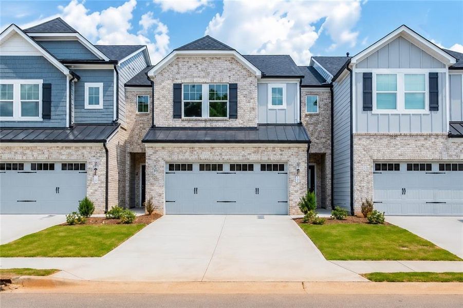 Front exterior of a new home in , Mableton, GA, highlighting curb appeal (Image 1). Front exterior of a new home in , Mableton, GA, highlighting curb appeal (Image 1).