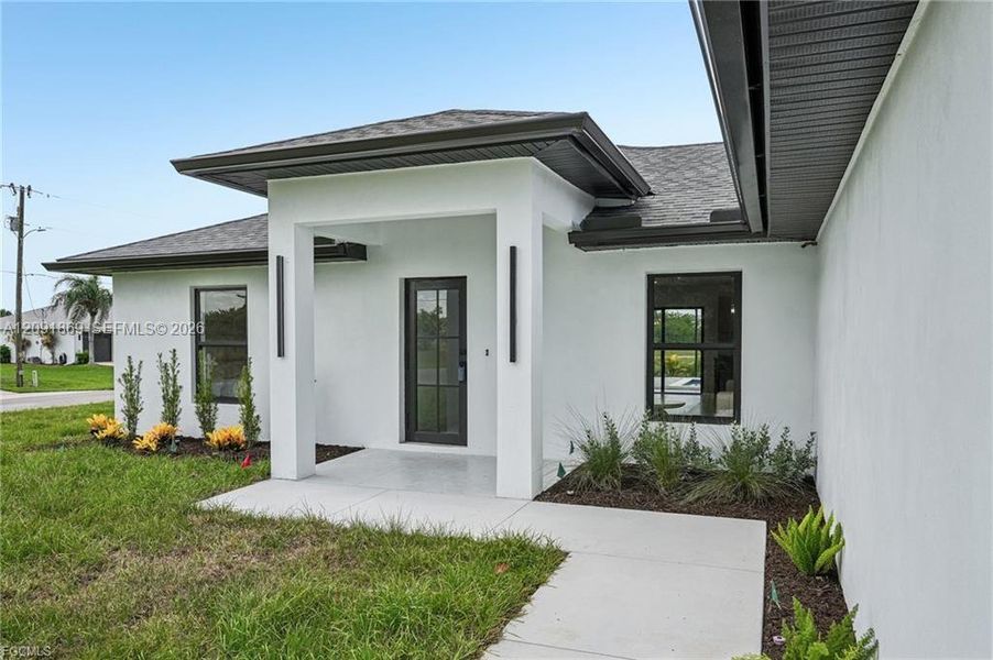 Exterior details and patio area of a home in , Cape Coral (Image 28). Exterior details and patio area of a home in , Cape Coral (Image 28).
