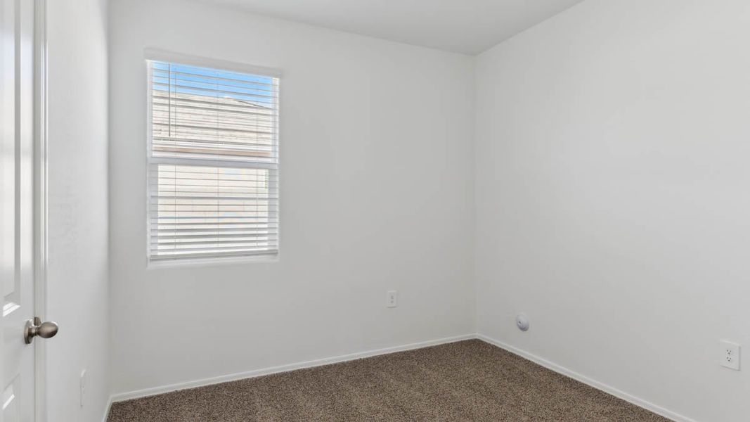 Spacious, unfurnished interior of a new home in Radiance at Superstition Vistas, Apache Junction (Image 16).
