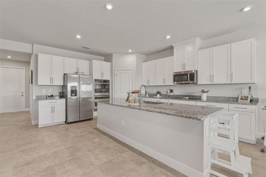 Furnished interior view inside a new home in West Port Single Family Homes, Port Charlotte (Image 10).