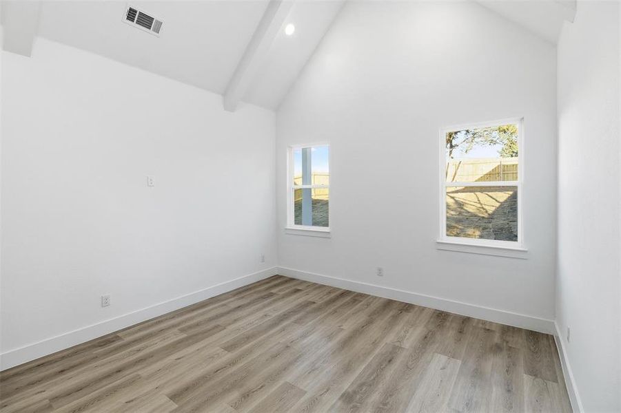 Unfurnished room featuring light wood-type flooring and recessed lighting