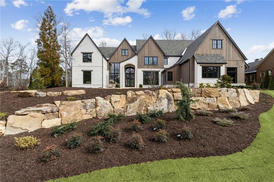Front exterior of a new home in , Suwanee, GA, highlighting curb appeal (Image 30).