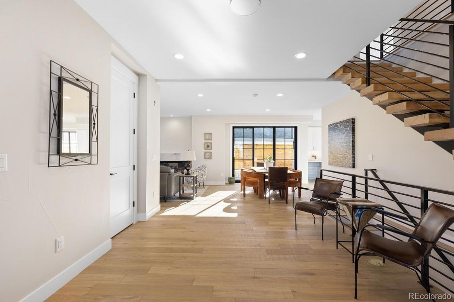 Bright and light entry opens to the main level Bright and light entry opens to the main level