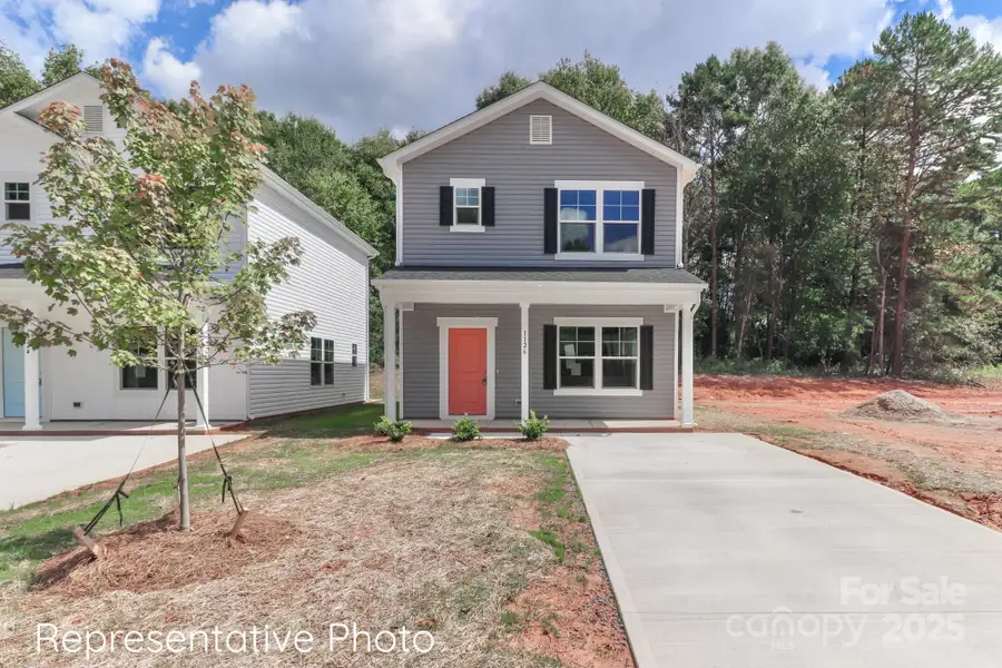Exterior details and patio area of a home in , Mooresville (Image 13).