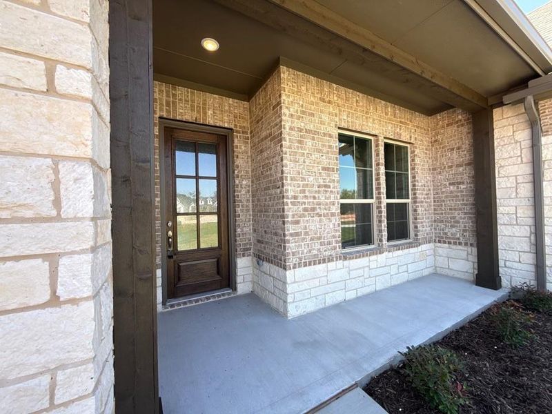 Exterior details and patio area of a home in Oak Grove Addition, Springtown (Image 3).
