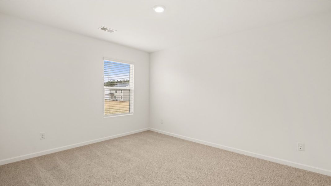 Spacious, unfurnished interior of a new home in Estates at Deer Hollow, Grovetown (Image 38).